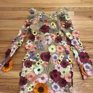 Floral mini backless dress so so cute and fitting just looks weird on floor
